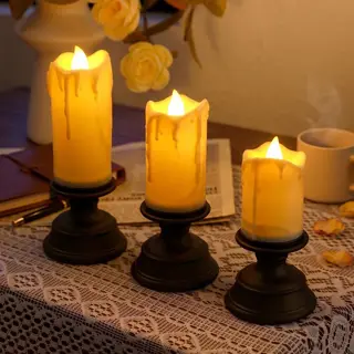 LED Drip Wax Pillar Candles on Black Holders